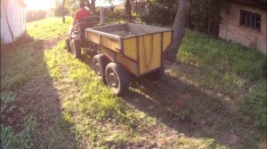 Кубота з причіпом самоскидом