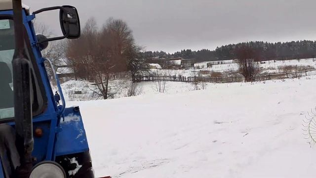 ЛТЗ 55 Уборка снега со двора.Поставил печку ( улитку ) по колхозному. смотреть онлайн