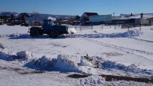 Первое испытание самодельного снежного отвала на Т-150