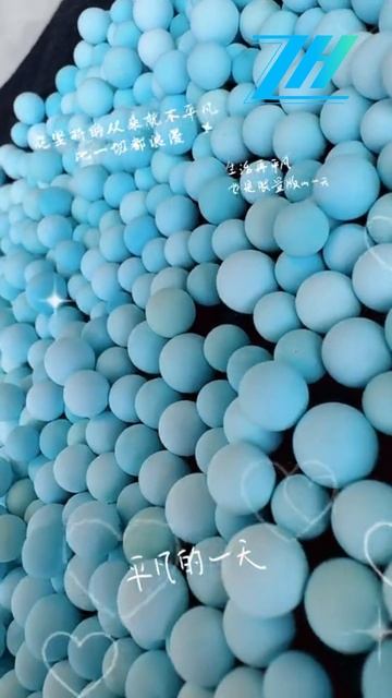 250326-9 Natural raw ore turquoise round bead has a glossy and moist sheen with natural patterns.