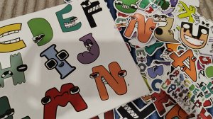 наш альбом с наклейками алфавит лор и цифра лора, детские наклейки алфавит лор, alphabet lore