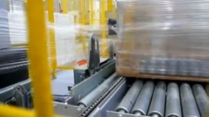 Rotoplat 3000 HD automatic stretch wrapper with infeed outfeed conveyor and Top Platen - Robopac US