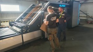 Работа кашировальной линии с переворотом HL-1450G в компании "Астролон" г. Ростов-на-Дону