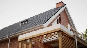 Дом из газобетонных блоков и большой террасой.