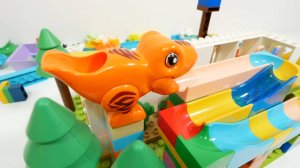 Развивающие мультики Развивающие детские игрушки Гонка шариков Волновой склон Животные Динозавры