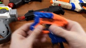 Самый маленький пистолет аналог NERF Стреляет стрелами НЕРФ из магазина Кари