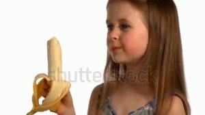 7 Years Old Girl Eating A Big Banana