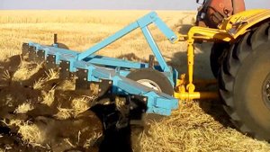 К-701 с плугом ПБС-8