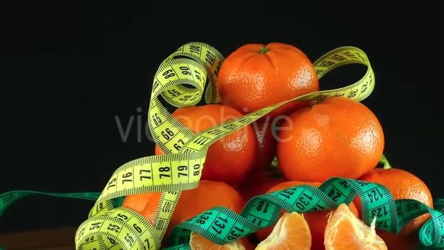 Mandarin And Tape Measure Turning 18 | Stock Footage - Envato elements смотреть онлайн