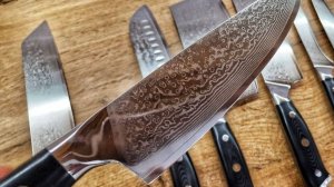 Дамасские кухонные ножи с черной рукояткой