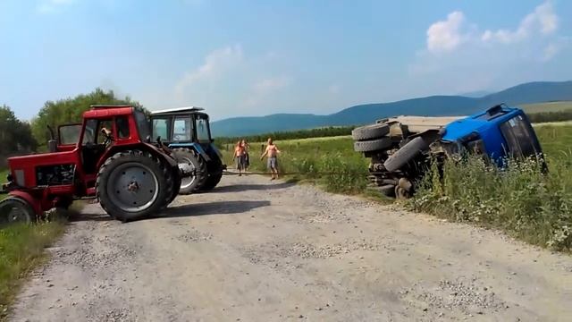2 МТЗ тягнуть МАЗ смотреть онлайн