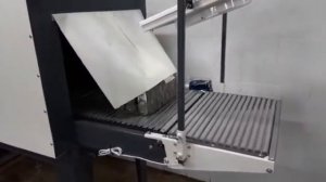 Термоусадочная машина ТМ 1Р  Групповая упаковка бутылок с морсом