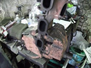 замена прокладки выпускного коллектора на 31105