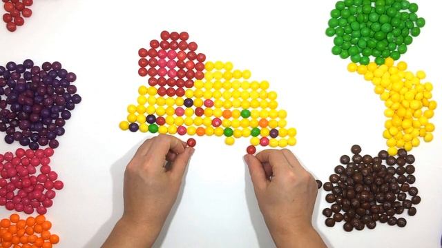 Rainbow cupcake learn colors in English muffin with M & Ms and skittles