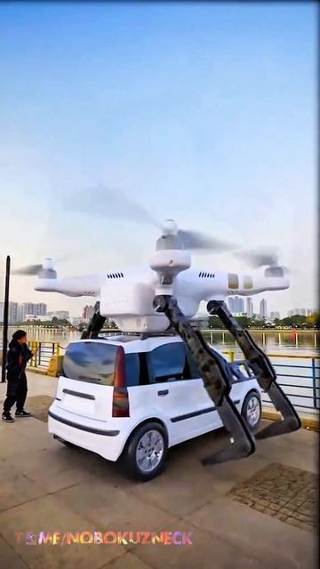 Поскорей бы уже такое

Концепт дрона для транспортировки автомобилей, и крупногабаритного груза.