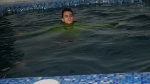 Wetlook Man | Wetlook man in sweater swims in the pool | Wetlook man Jeans