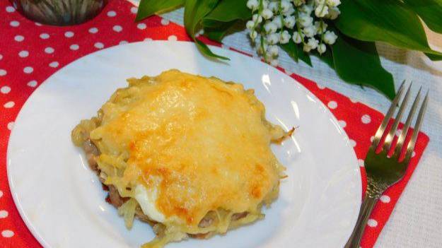 Мясные  лепешки запеченные под сыром