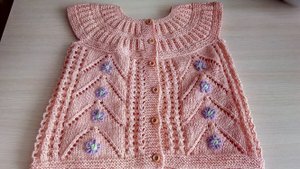 Вышивка на вязаном полотне.Цветы.