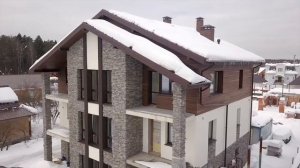 Отделка фасада дома доской. После двухлетней эксплуатации.