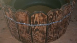 Классная клумба от Санька из шины и досок своими руками