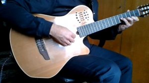 Август (Ян Френкель) на гитаре