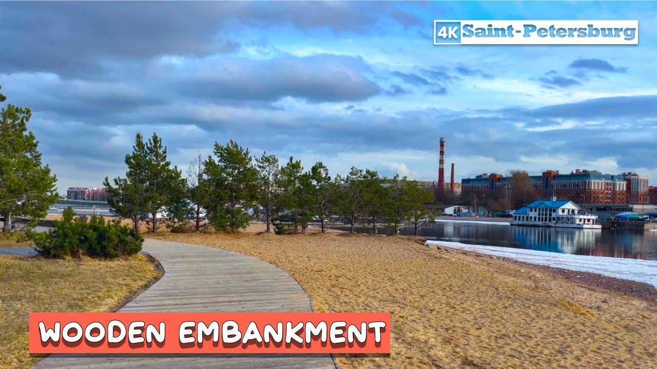 Walk along the Wooden embankment to the Bolshoi Petrovsky Bridge in St. Petersburg Krestovsky Island смотреть онлайн