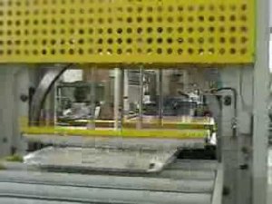 Упаковка дверей в стретч пленку на автоматической машине AREA 140