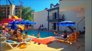 Zeus Turunc Hotel 3⭐ огляд басейну та бару.