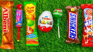 Распаковка Самых популярных конфет ASMR несколько партий разноцветных радужных леденцов на палочке