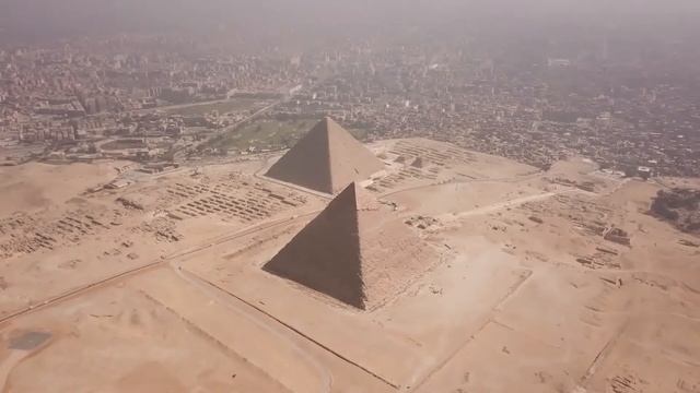 View of the Egyptian pyramids from a drone.Bird's-eye view.To beautiful music.
