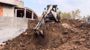 Buldoexcavator Terex 820