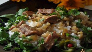 Свинина под соусом из солёных огурцов