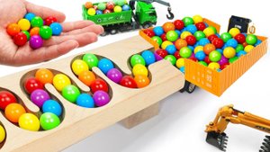 Видео для детей. Шарики скатываем через лабиринт в игрушечные машинки и грузовики. Детям. ##77