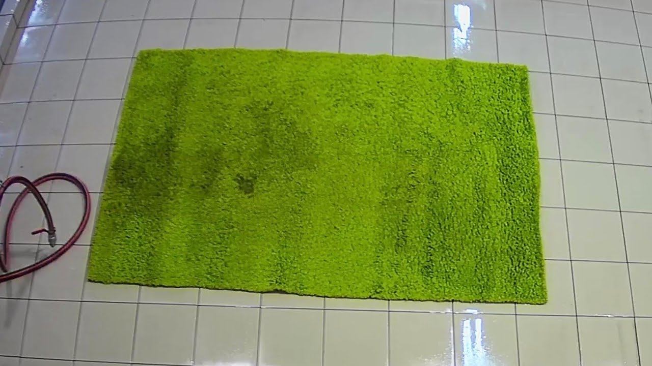 Striking contrast: the transformation of a green fluffy carpet is literally before our eyes!