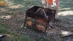 Lighting a fire. Cooking in a mountain village. Mila. cooking on an open fire. Mila naturist.