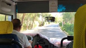 Дорога до пляжа на автобусе Aydinbey Queen's Palace and Spa Road to the beach by shuttle bus.