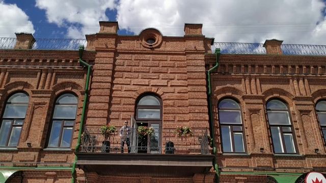 Музыкант на балконе