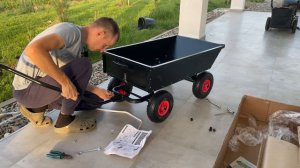 Нормальная четырехколесная тележка самосвал от Unikit для сада, которая не грузит спину