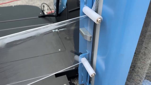 Roping Device for a Pallet Stretch Wrapping Machine