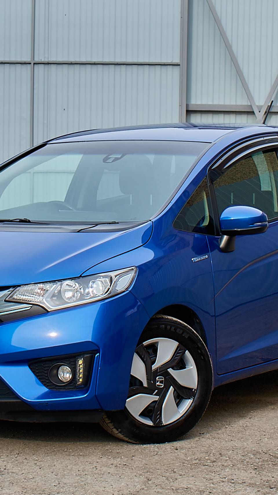 Обзор на Honda Fit Hybrid хетчбэк 5-дв. 1.5hyb AT 2014г