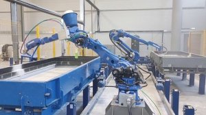 линия по производству панелей, участок нанесения стеклофибробетона роботом