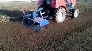 Трактор БЕЛАРУС 320.4М с почвофрезой