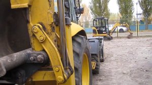 Экскаватор-погрузчик Komatsu WB93R-5