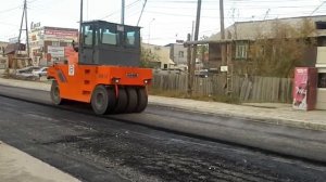 Каток работает на дороге