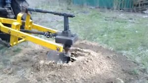 Копия видео "Ямобур для сельскохозяйственных работ в действии"