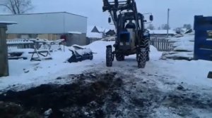 Грузим остатки навоза трактором МТЗ 82