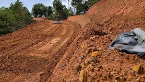 The Dozer Leveling Ground For Logging Road Construction On The Mountain
