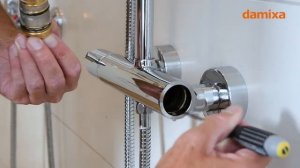 How do I change the cartridge of my Damixa thermostatic mixer?