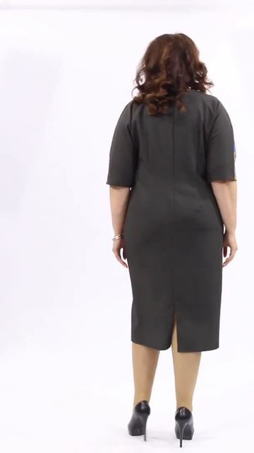 Женственное платье зеленого цвета с бантом