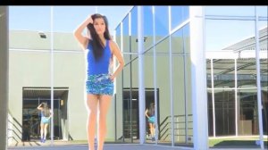 Sexy teen girl in blue mini skirt